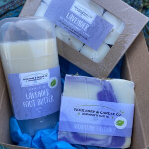 A Hint of Lavender gift box contains Lavender Foot Butter, lavender soap, and lavender tea lights