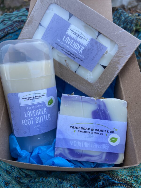 A Hint of Lavender gift box contains Lavender Foot Butter, lavender soap, and lavender tea lights