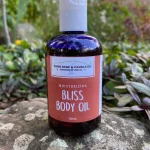 Our moisturizing bliss body oil 120 ml bottle.